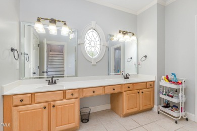 Experience unparalleled luxury and breathtaking views in this on TPC at Wakefield Plantation in North Carolina - for sale on GolfHomes.com, golf home, golf lot