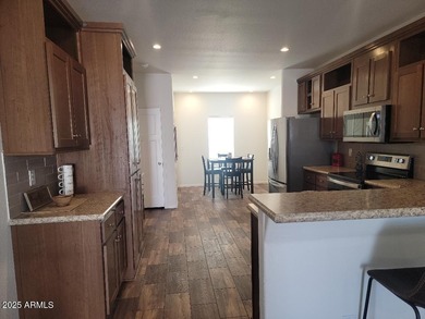 This is a beautiful new build 3 bedroom 2 bath home. Laminate on 3 Parks Fairways in Arizona - for sale on GolfHomes.com, golf home, golf lot