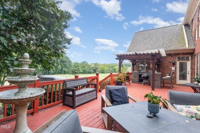 Experience unparalleled luxury and breathtaking views in this on TPC at Wakefield Plantation in North Carolina - for sale on GolfHomes.com, golf home, golf lot