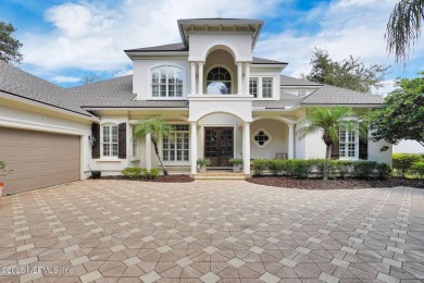 This stunning custom-built home offers an open yet traditional on The Palencia Club in Florida - for sale on GolfHomes.com, golf home, golf lot