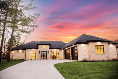 You'll know this luxurious home is something special the moment on Hide-A-Way Lake Golf Course in Texas - for sale on GolfHomes.com, golf home, golf lot