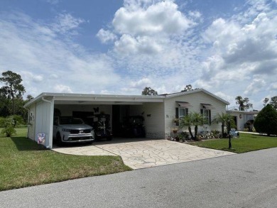 This three-bed, two-bath beauty is spacious and clean with on Four Lakes Golf Club in Florida - for sale on GolfHomes.com, golf home, golf lot