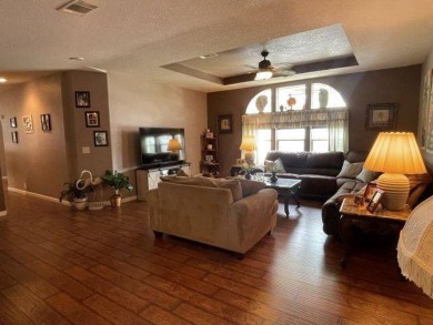 This three-bed, two-bath beauty is spacious and clean with on Four Lakes Golf Club in Florida - for sale on GolfHomes.com, golf home, golf lot