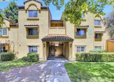 Discover serene living in this top-floor unit, offering stunning on Canyon Lakes Country Club in California - for sale on GolfHomes.com, golf home, golf lot