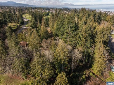 Approximately 3/4 acre in a neighborhood of upscale homes on Peninsula Golf Club Inc. in Washington - for sale on GolfHomes.com, golf home, golf lot
