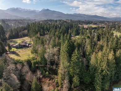 Approximately 3/4 acre in a neighborhood of upscale homes on Peninsula Golf Club Inc. in Washington - for sale on GolfHomes.com, golf home, golf lot
