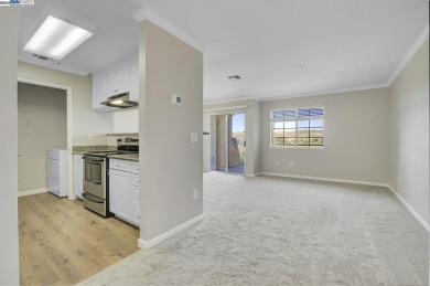 Discover serene living in this top-floor unit, offering stunning on Canyon Lakes Country Club in California - for sale on GolfHomes.com, golf home, golf lot