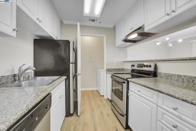 Discover serene living in this top-floor unit, offering stunning on Canyon Lakes Country Club in California - for sale on GolfHomes.com, golf home, golf lot