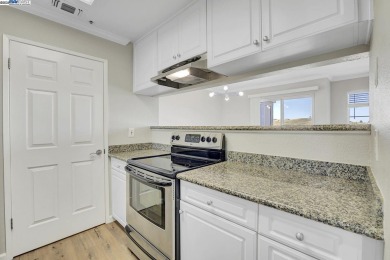 Discover serene living in this top-floor unit, offering stunning on Canyon Lakes Country Club in California - for sale on GolfHomes.com, golf home, golf lot