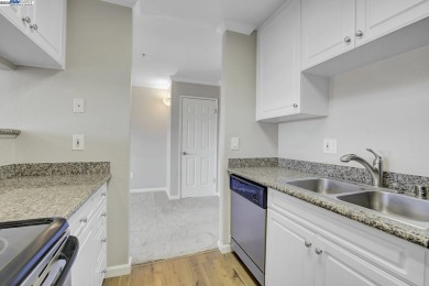 Discover serene living in this top-floor unit, offering stunning on Canyon Lakes Country Club in California - for sale on GolfHomes.com, golf home, golf lot