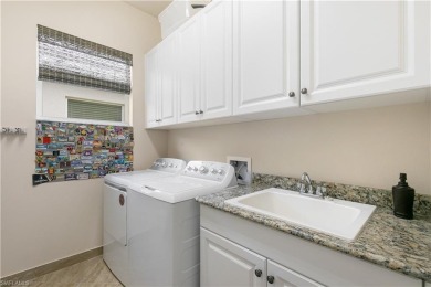 Step into pure perfection at Hampton Model Villa in the highly on Palmira Golf and Country Club in Florida - for sale on GolfHomes.com, golf home, golf lot
