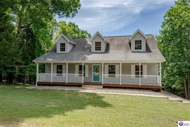 Welcome to this beautiful Cape Cod-style home nestled in on Doe Valley Country Club in Kentucky - for sale on GolfHomes.com, golf home, golf lot