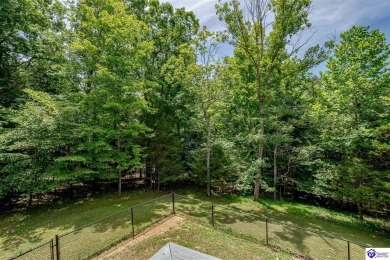 Welcome to this beautiful Cape Cod-style home nestled in on Doe Valley Country Club in Kentucky - for sale on GolfHomes.com, golf home, golf lot