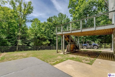 Welcome to this beautiful Cape Cod-style home nestled in on Doe Valley Country Club in Kentucky - for sale on GolfHomes.com, golf home, golf lot