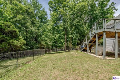 Welcome to this beautiful Cape Cod-style home nestled in on Doe Valley Country Club in Kentucky - for sale on GolfHomes.com, golf home, golf lot