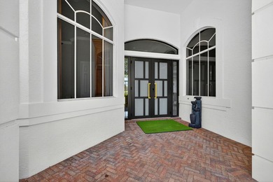 Set on a private cul-de-sac in the boutique Ironhorse community on  in Florida - for sale on GolfHomes.com, golf home, golf lot