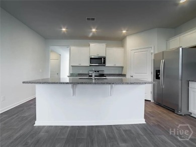 This beautiful 4-bedroom, 3-bath home features a fantastic open on Sterling Links Golf Club in Georgia - for sale on GolfHomes.com, golf home, golf lot