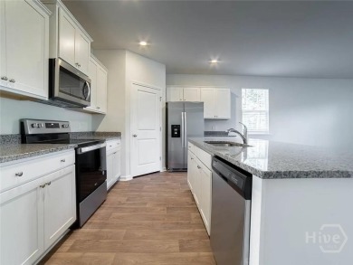 This beautiful 4-bedroom, 3-bath home features a fantastic open on Sterling Links Golf Club in Georgia - for sale on GolfHomes.com, golf home, golf lot