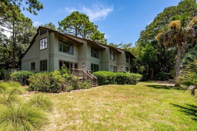 This beautifully updated end-unit 3BR/3BA Fairway Oaks villa on Kiawah Island Resort - Cougar Point in South Carolina - for sale on GolfHomes.com, golf home, golf lot