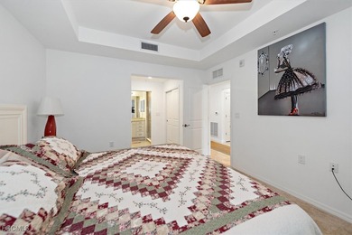 A rare 1st FLOOR, 2-bedroom home at sought after Palazzo III at on Pelican Preserve Golf Club in Florida - for sale on GolfHomes.com, golf home, golf lot