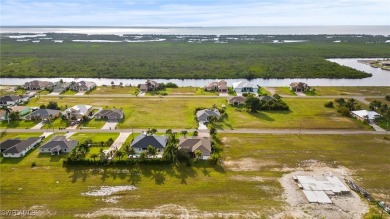 Beautiful Pool Home in Northwest Cape Coral! Located across from on Burnt Store Golf Club in Florida - for sale on GolfHomes.com, golf home, golf lot