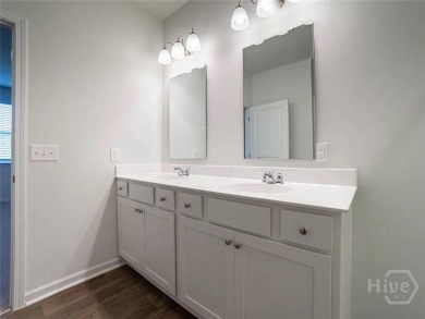 This beautiful 4-bedroom, 3-bath home features a fantastic open on Sterling Links Golf Club in Georgia - for sale on GolfHomes.com, golf home, golf lot