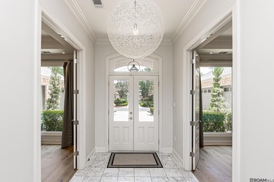 Experience the essence of refined living in this stunning 5 on Pelican Point Golf Club in Louisiana - for sale on GolfHomes.com, golf home, golf lot