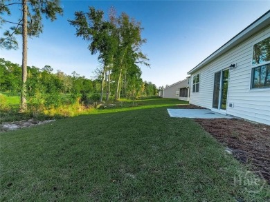 This beautiful 4-bedroom, 3-bath home features a fantastic open on Sterling Links Golf Club in Georgia - for sale on GolfHomes.com, golf home, golf lot