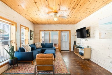 This end-unit, townhouse-style condo is perfectly located near on Palmilla Beach Golf Club in Texas - for sale on GolfHomes.com, golf home, golf lot