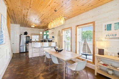 This end-unit, townhouse-style condo is perfectly located near on Palmilla Beach Golf Club in Texas - for sale on GolfHomes.com, golf home, golf lot