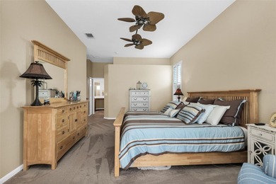 Don't miss this beautifully updated 4-bedroom, 3-bath pool home on Riverwood Golf Club in Florida - for sale on GolfHomes.com, golf home, golf lot