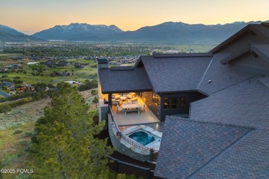Perched atop a prominent ridgeline, this stunning residence is on Red Ledges Golf Club in Utah - for sale on GolfHomes.com, golf home, golf lot