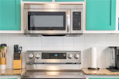 This end-unit, townhouse-style condo is perfectly located near on Palmilla Beach Golf Club in Texas - for sale on GolfHomes.com, golf home, golf lot