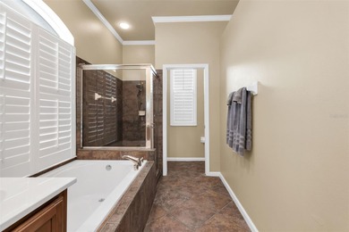 Don't miss this beautifully updated 4-bedroom, 3-bath pool home on Riverwood Golf Club in Florida - for sale on GolfHomes.com, golf home, golf lot