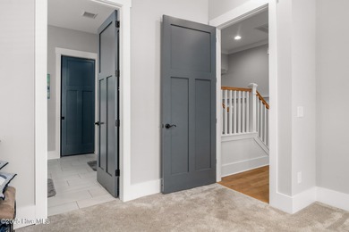 Welcome to this custom-built gem by Coleman Fine Homes on Carolina National Golf Club in North Carolina - for sale on GolfHomes.com, golf home, golf lot