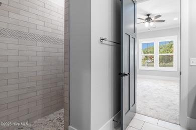 Welcome to this custom-built gem by Coleman Fine Homes on Carolina National Golf Club in North Carolina - for sale on GolfHomes.com, golf home, golf lot