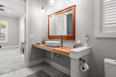 Welcome to this custom-built gem by Coleman Fine Homes on Carolina National Golf Club in North Carolina - for sale on GolfHomes.com, golf home, golf lot