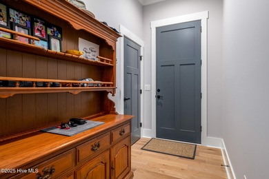 Welcome to this custom-built gem by Coleman Fine Homes on Carolina National Golf Club in North Carolina - for sale on GolfHomes.com, golf home, golf lot