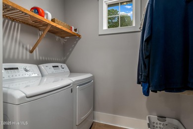 Welcome to this custom-built gem by Coleman Fine Homes on Carolina National Golf Club in North Carolina - for sale on GolfHomes.com, golf home, golf lot