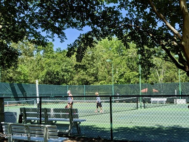 Welcome to this custom-built gem by Coleman Fine Homes on Carolina National Golf Club in North Carolina - for sale on GolfHomes.com, golf home, golf lot
