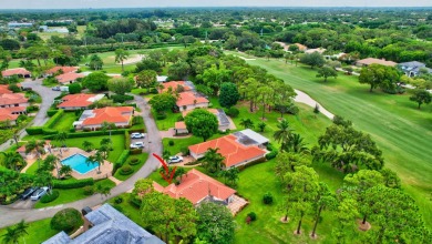 Welcome to 2 Fairway Drive, a beautiful Mediterranean on Delray Dunes Golf and Country Club in Florida - for sale on GolfHomes.com, golf home, golf lot
