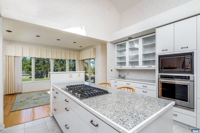 Stunning custom-built home set along the beautiful 6th Fairway on SunLand Golf and Country Club in Washington - for sale on GolfHomes.com, golf home, golf lot