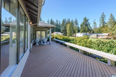 Stunning custom-built home set along the beautiful 6th Fairway on SunLand Golf and Country Club in Washington - for sale on GolfHomes.com, golf home, golf lot