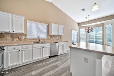 This stunning Augusta model in the vibrant PebbleCreek community on Tuscany Falls At Pebble Creek in Arizona - for sale on GolfHomes.com, golf home, golf lot