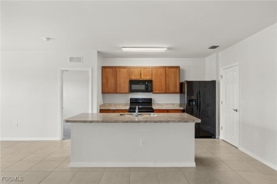 Welcome to your dream home in the highly sought-after Entrada on Sabal Springs Golf and Racquet Club in Florida - for sale on GolfHomes.com, golf home, golf lot