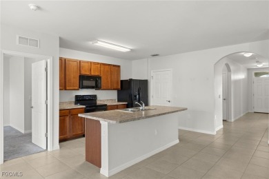 Welcome to your dream home in the highly sought-after Entrada on Sabal Springs Golf and Racquet Club in Florida - for sale on GolfHomes.com, golf home, golf lot