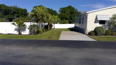 Beautiful, well maintained home located in Lily Lake Golf & RV on Lily Lake Golf and RV Resort in Florida - for sale on GolfHomes.com, golf home, golf lot