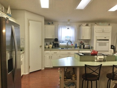 ONE OF THE LARGEST HOMES IN THIS COMMUNITY. THIS 1560 SF HOME IS on Spanish Lakes I in Florida - for sale on GolfHomes.com, golf home, golf lot