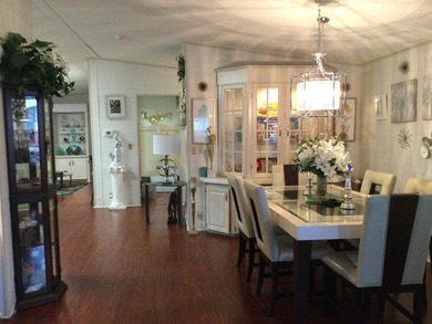 ONE OF THE LARGEST HOMES IN THIS COMMUNITY. THIS 1560 SF HOME IS on Spanish Lakes I in Florida - for sale on GolfHomes.com, golf home, golf lot