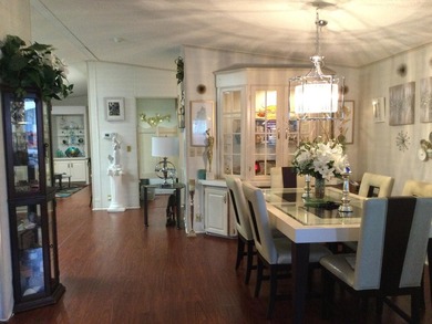 ONE OF THE LARGEST HOMES IN THIS COMMUNITY. THIS 1560 SF HOME IS on Spanish Lakes I in Florida - for sale on GolfHomes.com, golf home, golf lot